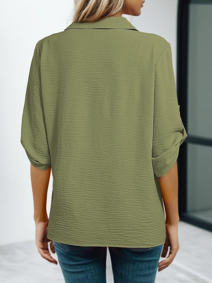Army green crinkled texture Johnny collar shirt with rolled sleeves.