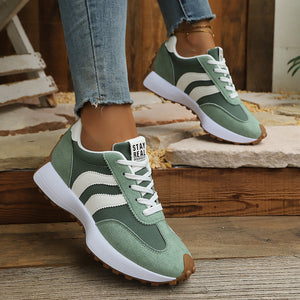 Purple sneakers with lace-up and striped