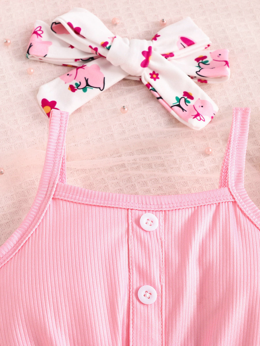 Pink ribbed tank top with button detail and matching printed headband.