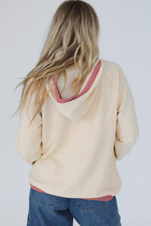 65% polyester, 35% cotton Care instructions: Machine wash cold pullover hoodie in White with relaxed silhouette