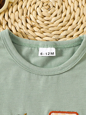 Light green cotton baby tee with embroidered tractor detail and crew neck.