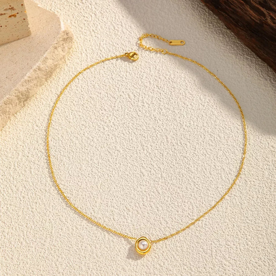 Synthetic Pearl, 18K Gold-Plated, Stainless Steel Care instructions: Avoid weari necklace in ivory with slim silhouette
