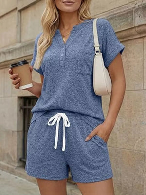 Relaxed blue two-piece set with pocketed top and drawstring shorts