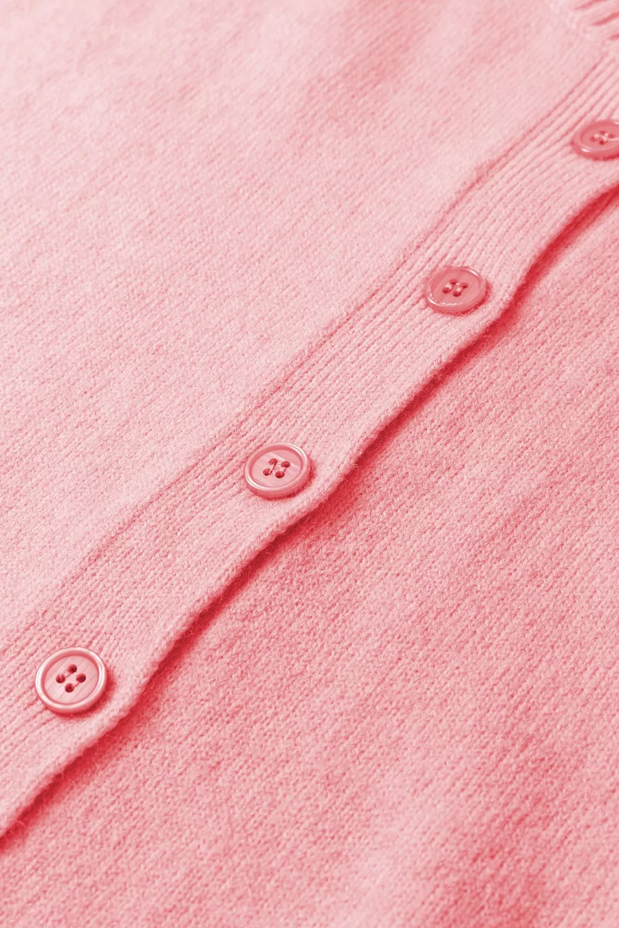 Pink acrylic knit cardigan with button front detail