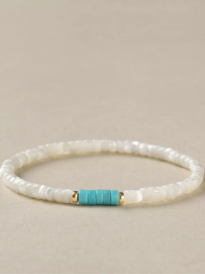 Turquoise,White mother-of-pearl Care instructions: 1 bracelet in white with beaded silhouette