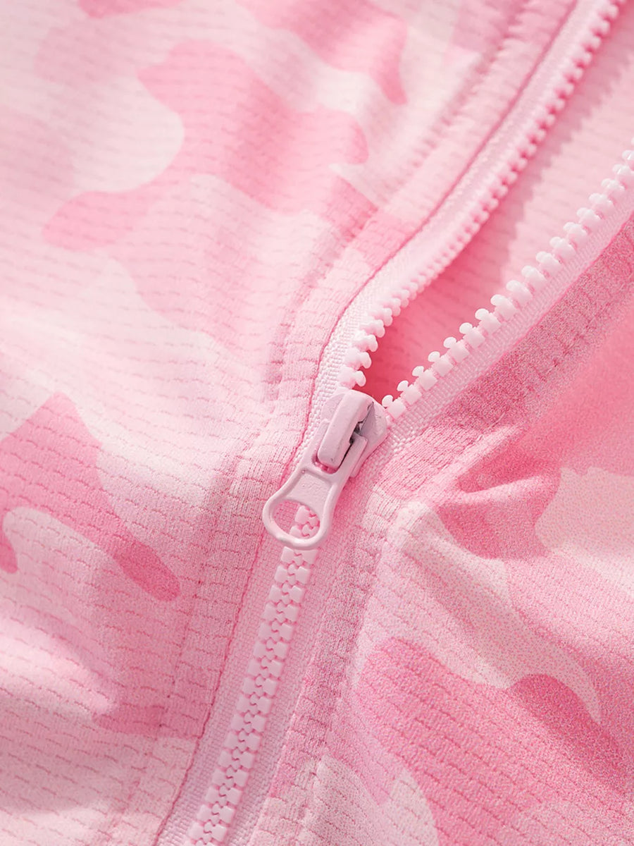 Blush pink camouflage hooded jacket for kids with a full zip closure.