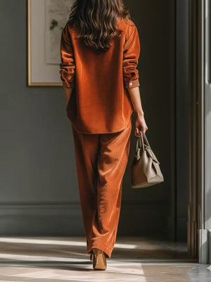 100% polyester Care instructions: Machine wash cold two-piece set in rust with relaxed silhouette