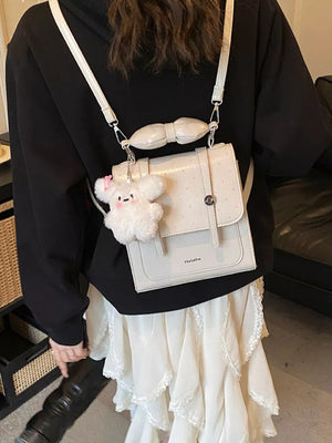 backpack featuring polka dot in ivory with PU Leather Imported Size & texture