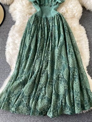 Green lace maxi dress with ruffled neckline and smocked waist