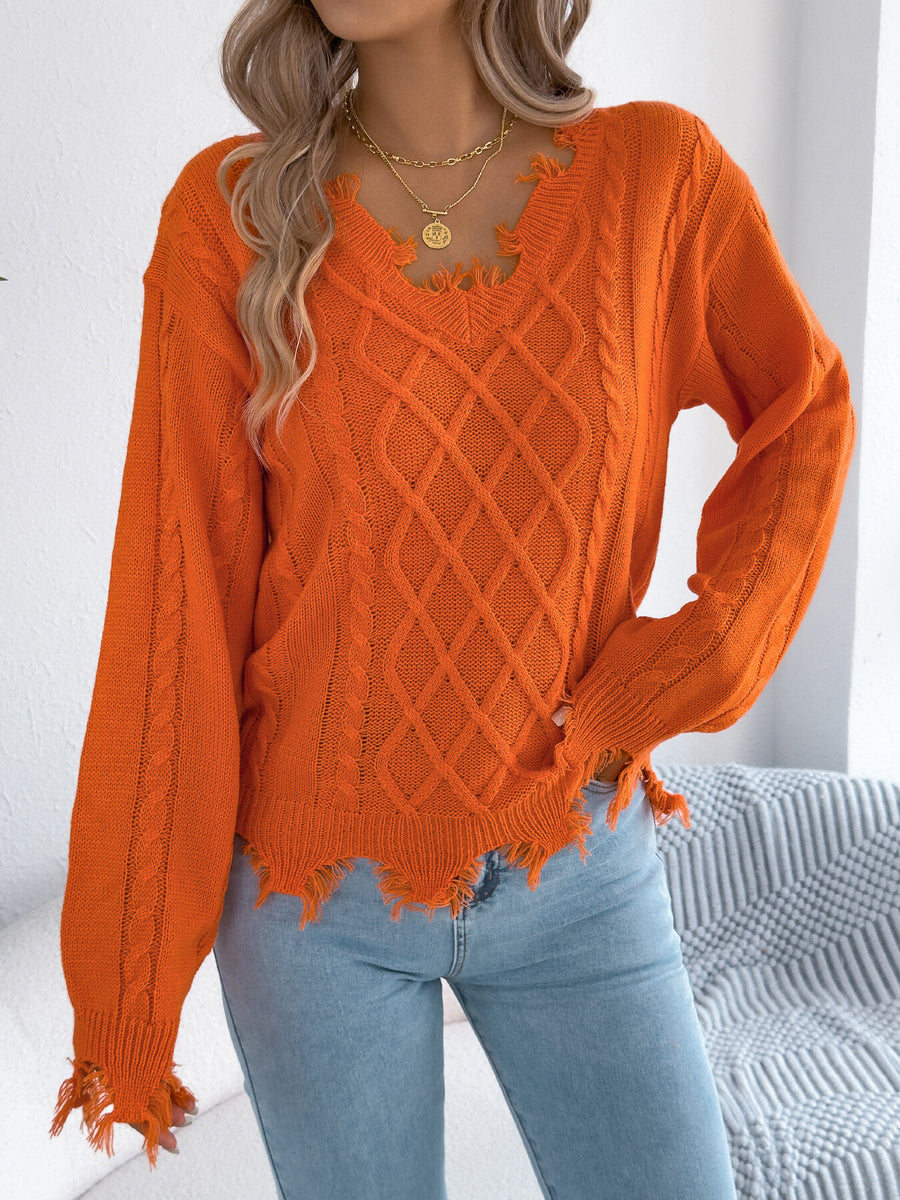 v-neck sweater in Orange with cable knit and distressed