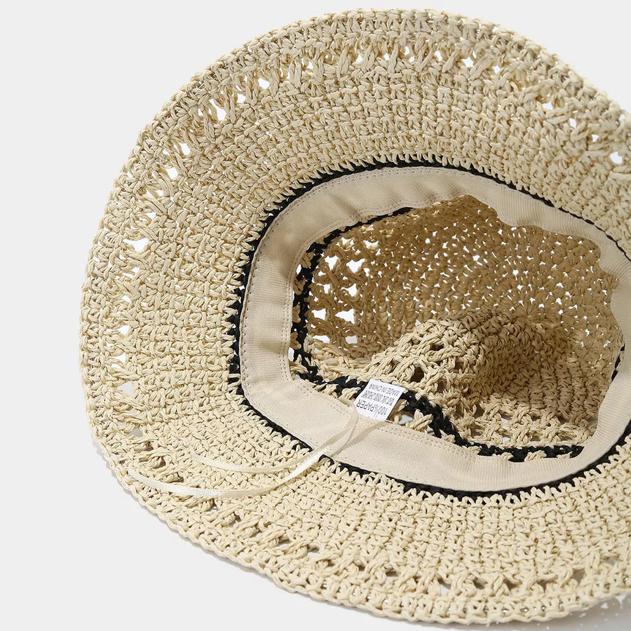 hat in black with striped and woven texture
