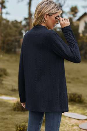 Textured open-front cardigan in dark blue with long sleeves and a relaxed fit.