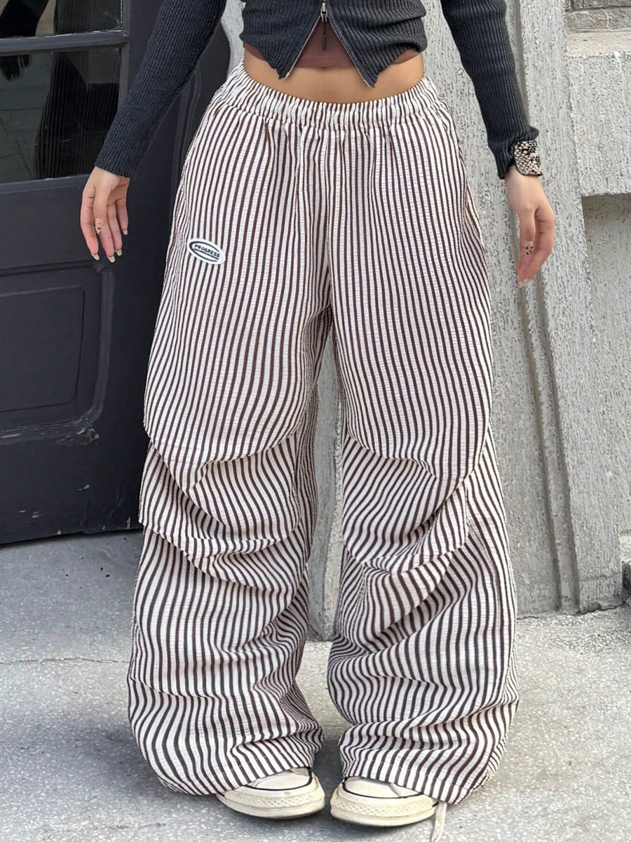 cargo pants featuring striped in cream with 100% polyester Care instructions: Machine wash cold texture