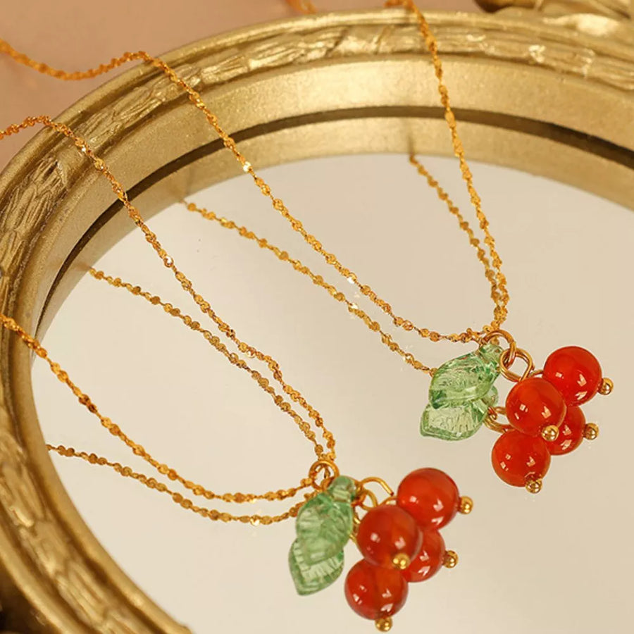 necklace in red-orange with pendant and collar length