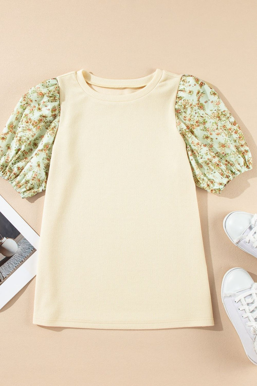 Beige ribbed knit top with floral puff sleeves