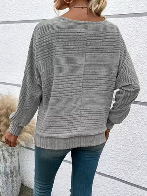 Gray ribbed acrylic sweatshirt with dolman sleeves and crew neck, shown from the back.