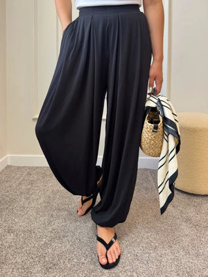 100% polyester Care instructions: Machine wash cold wide-leg pants in Brown with loose silhouette