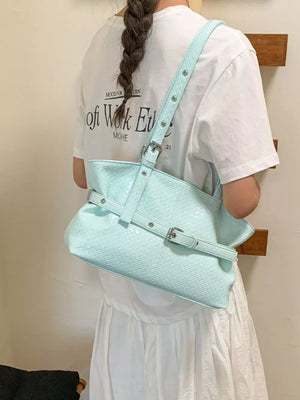 shoulder bag in black with woven and woven texture