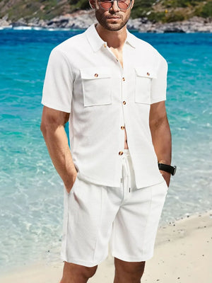 White textured resort shirt and shorts set with button details and drawstring waist.