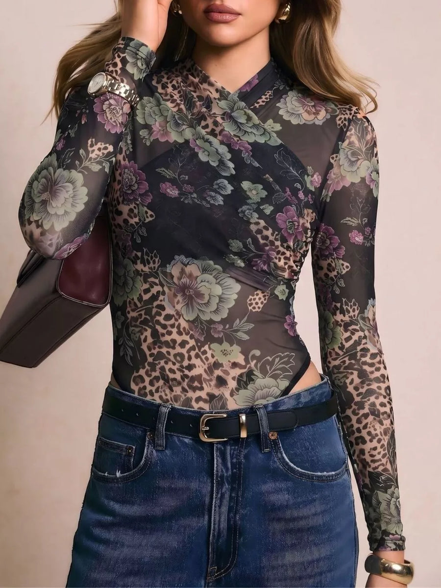 95% polyester, 5% elastane Care instructions: Machine wash cold bodysuit in deep purple with fitted silhouette