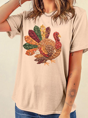 light beige t-shirt with graphic print and crew neck