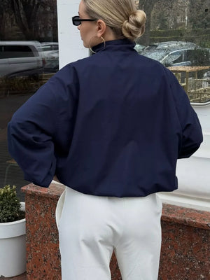 athleisure windbreaker in navy blue with mock neck