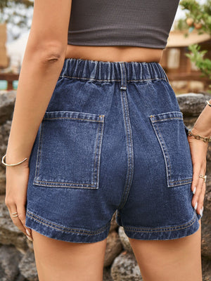 Dark blue denim cargo shorts with elastic waistband and patch pockets.