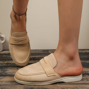 Khaki textured round toe slip-on loafers with decorative strap detail.