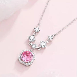 925 sterling silver,Zircon Care instructions: Avoid wearing during exercise, as necklace in pink with pendant silhouette