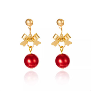 gold earrings with bow detail and not applicable
