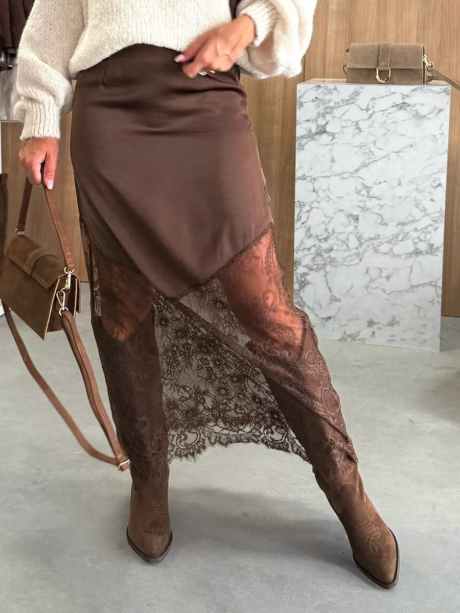 Women's brown midi skirt with lace trim detail and satin finish.