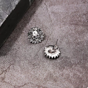 ACCESSORIES in antique silver with skull-sunflower motif and stud earring