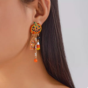black earrings featuring rhinestone embellishment and novelty print