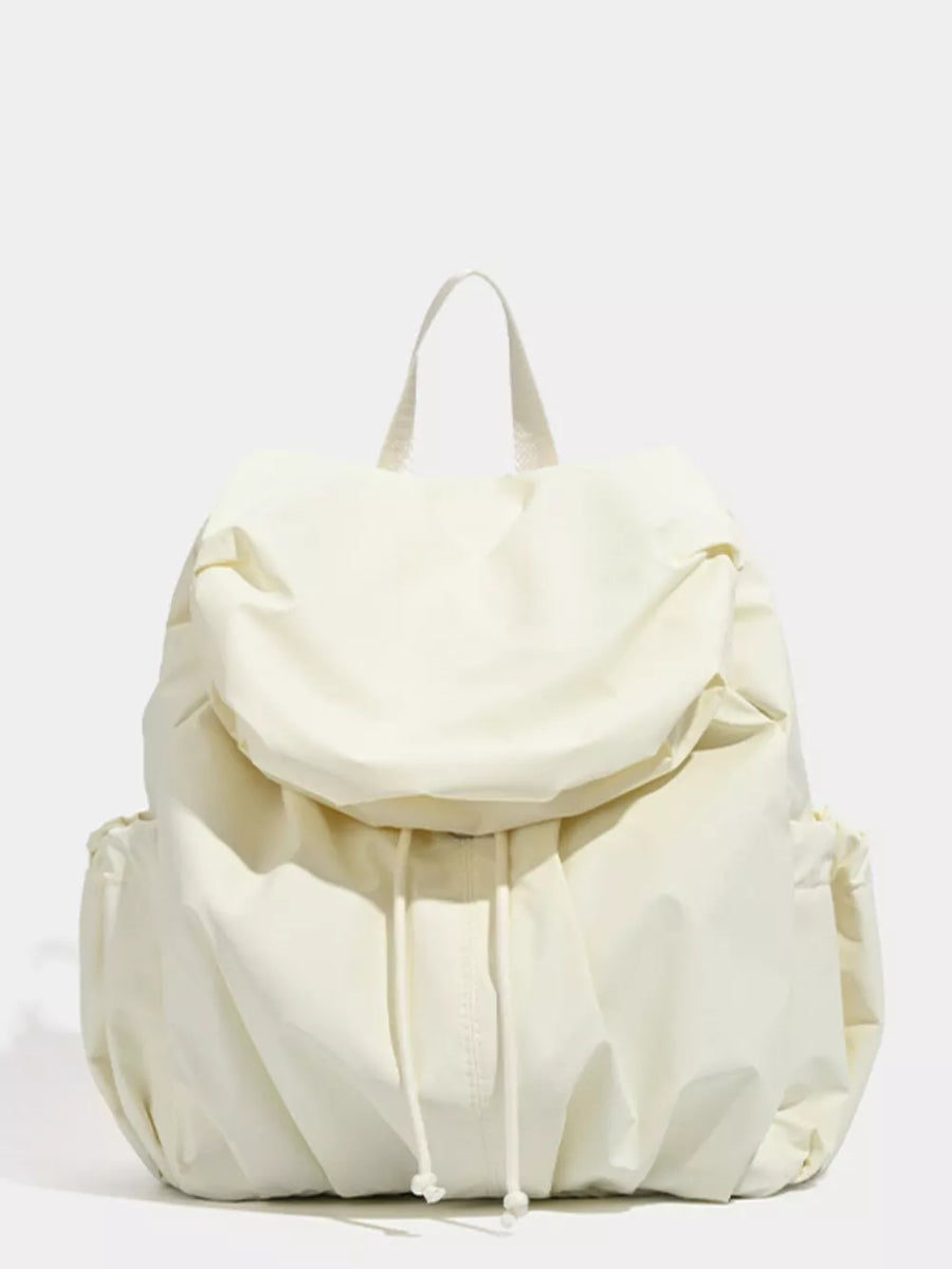 Cream nylon drawstring backpack with flap closure and side pockets