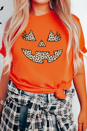 t-shirt in Orange with graphic and rolled sleeve