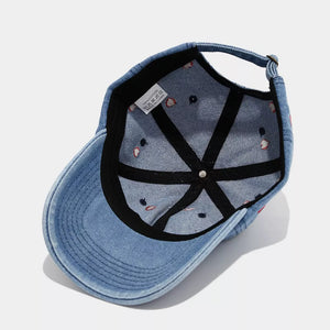 cap featuring heart in white with Denim Imported Size & texture