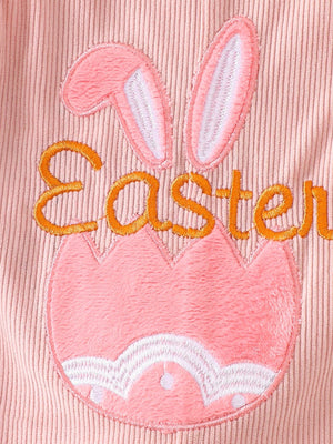 Pink corduroy baby one-piece with embroidered bunny ears and Easter egg detail.
