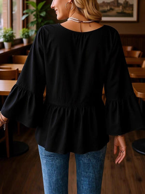 Black v-neck blouse with flounce sleeves and peplum hem