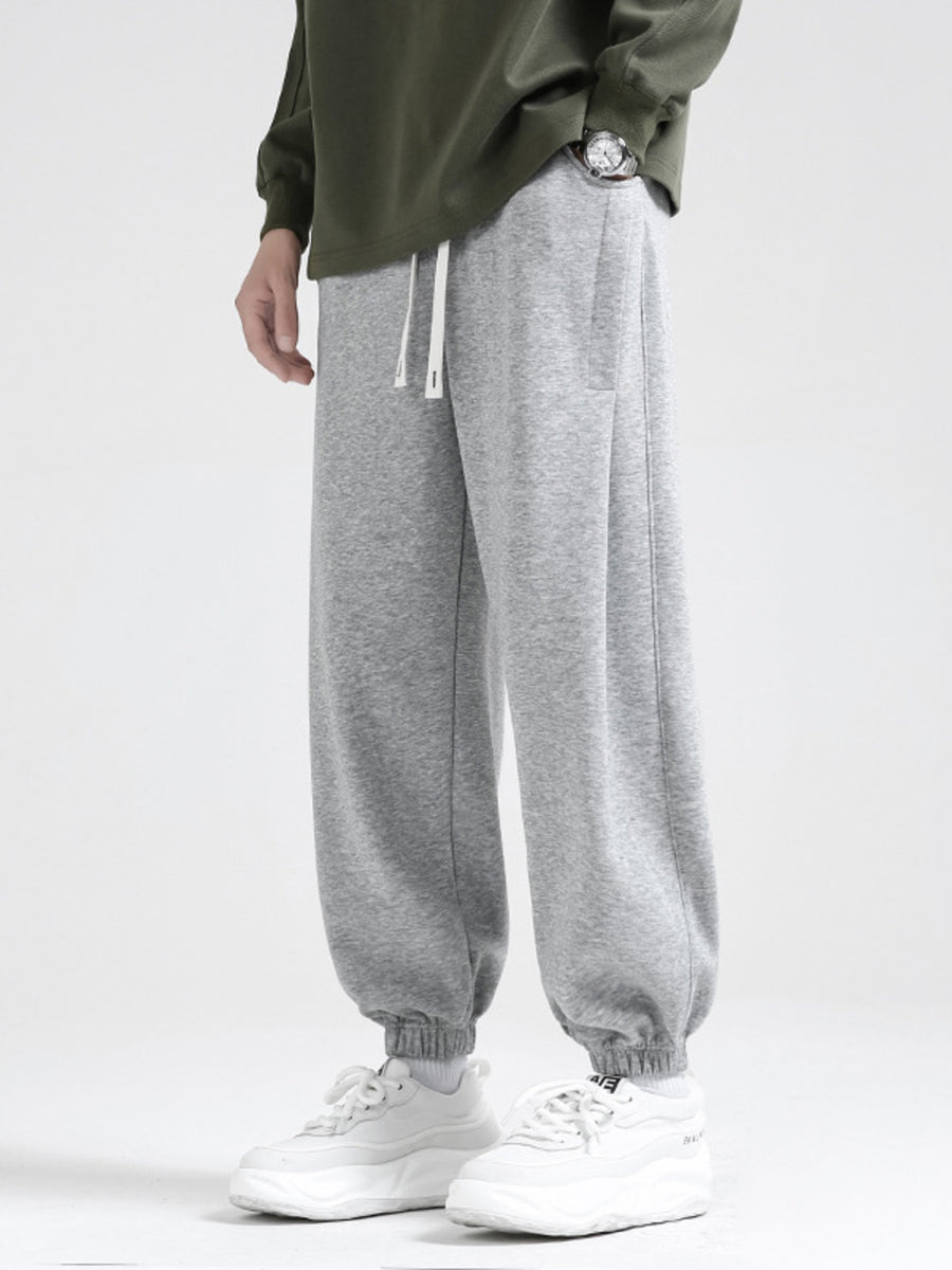 Light gray sweatpants for men with drawstring and relaxed fit
