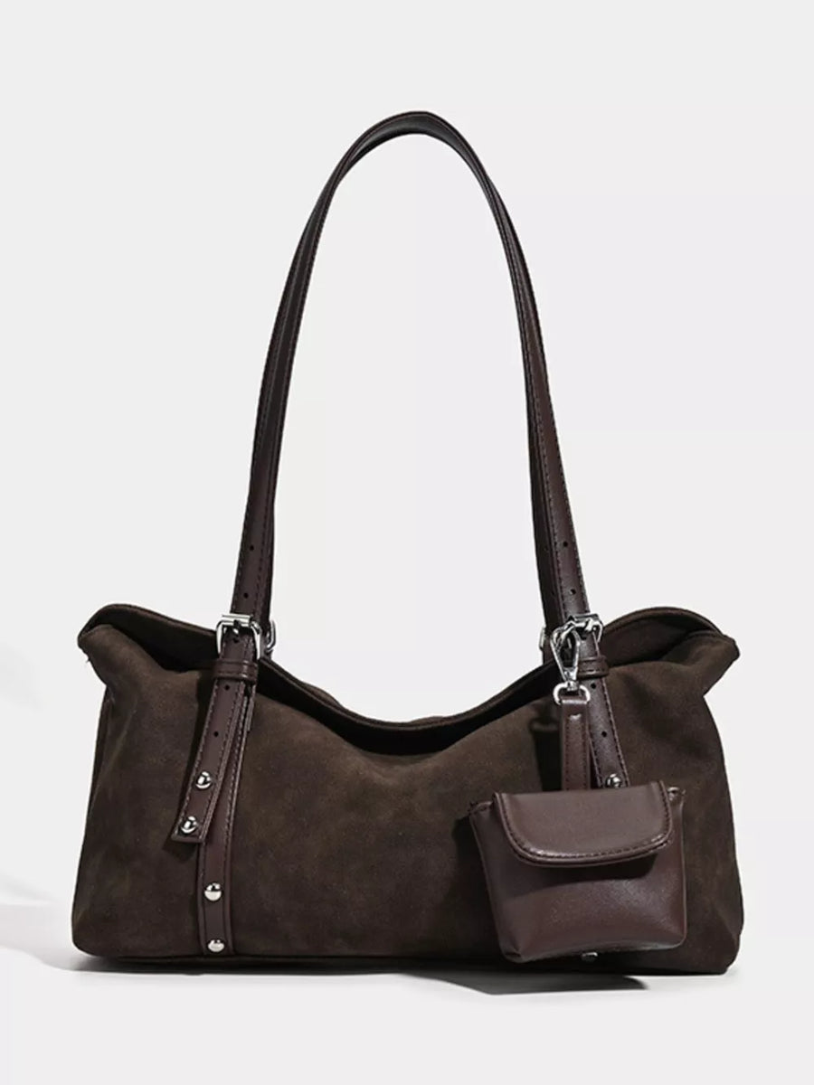 Brown suede medium shoulder bag with adjustable straps and a small attached pouch.