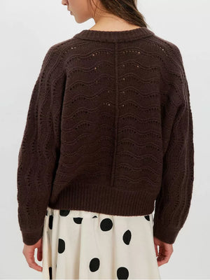 100% polyester Care instructions: Machine wash cold cardigan in Brown with relaxed silhouette