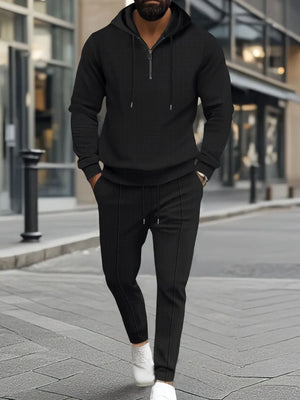 Black textured quarter-zip hoodie and matching jogger pants loungewear set