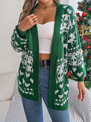 Festive jacquard open-front cardigan in dark green with white snowflake and heart pattern.