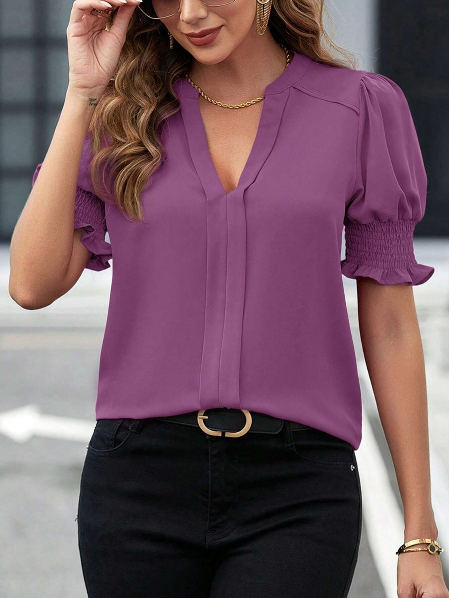 Mauve shirred sleeve plunge neckline blouse with ruffled cuffs