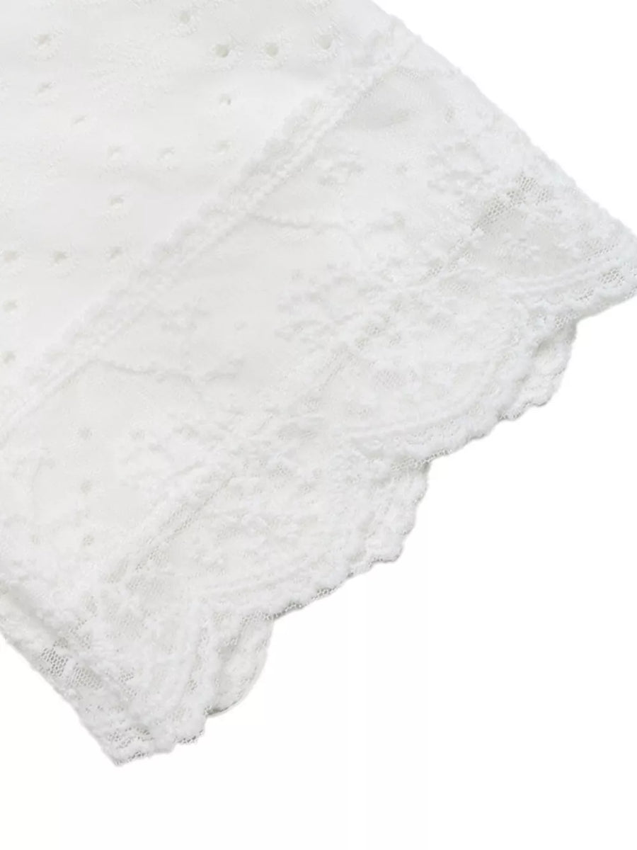 White eyelet lace detail maternity shirt with scalloped trim.