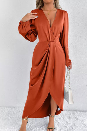 midi dress in Terracotta with deep v-neck and balloon sleeve