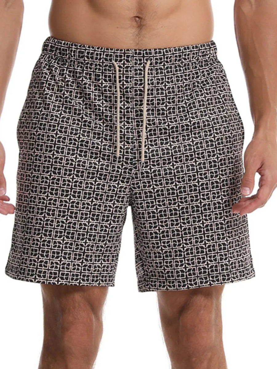 Geometric print boardshorts in black with a drawstring waist.