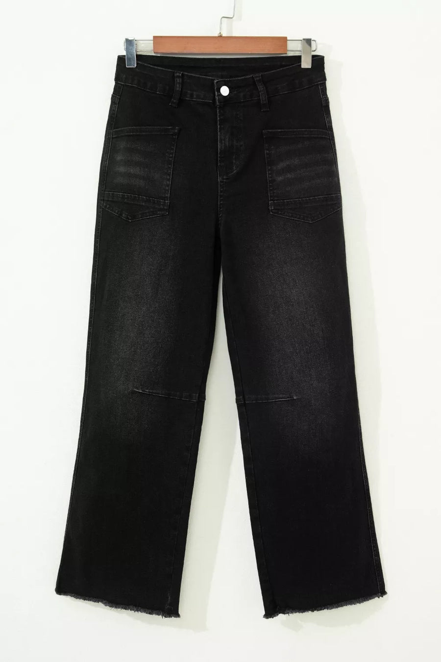 Black cotton blend cropped jeans with raw hem and patch pockets
