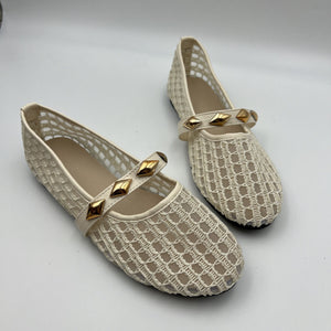 flats in Black with geometric and round toe