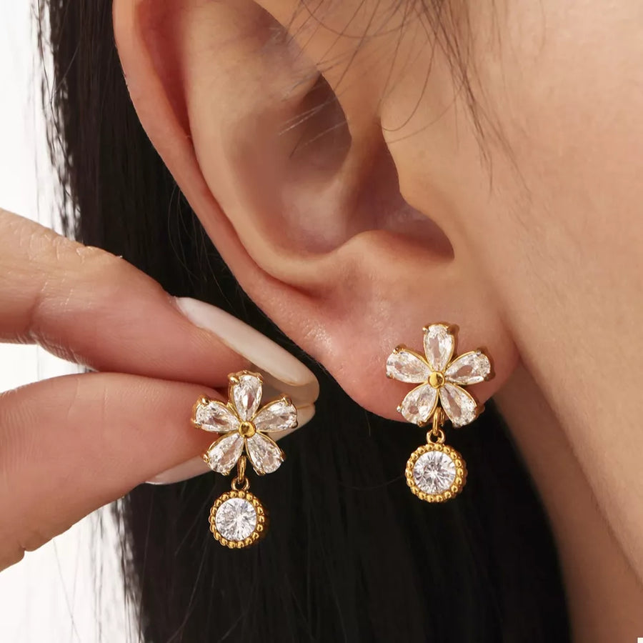 earrings featuring floral in clear with 18K Gold-Plated, Stainless Steel, Zircon Care instructions: Avoid wearing during